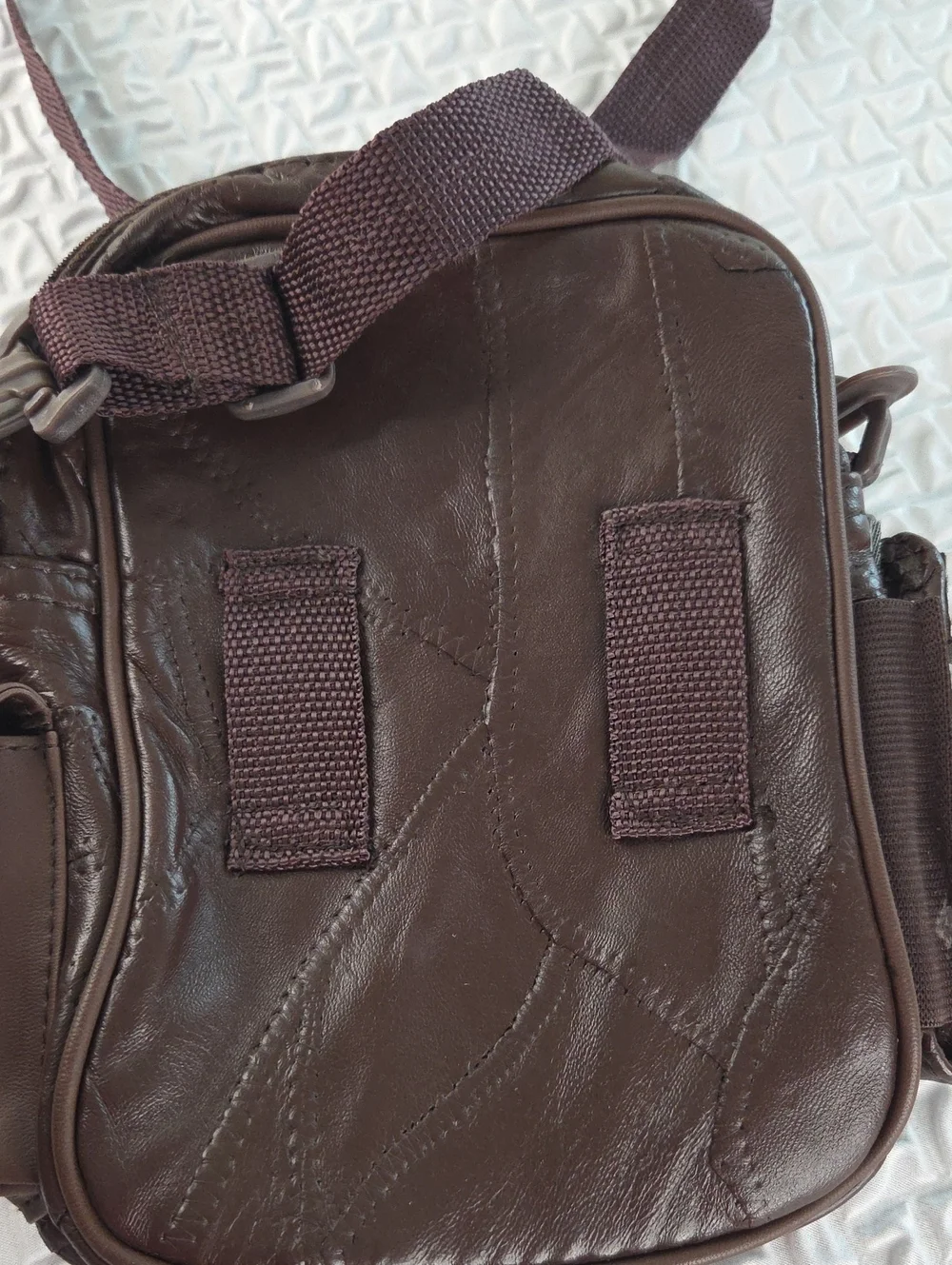 Crossbody MENS SLING BAG.Brown. English Leather PVC. RAIN RESISTANT